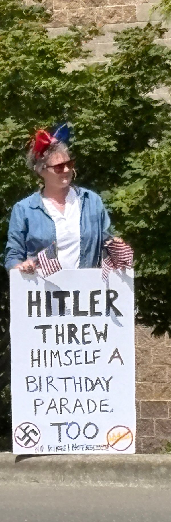 demonstrator with sign